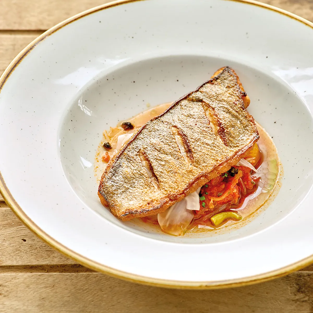 Pan-fried sea bream with puttanesca sauce