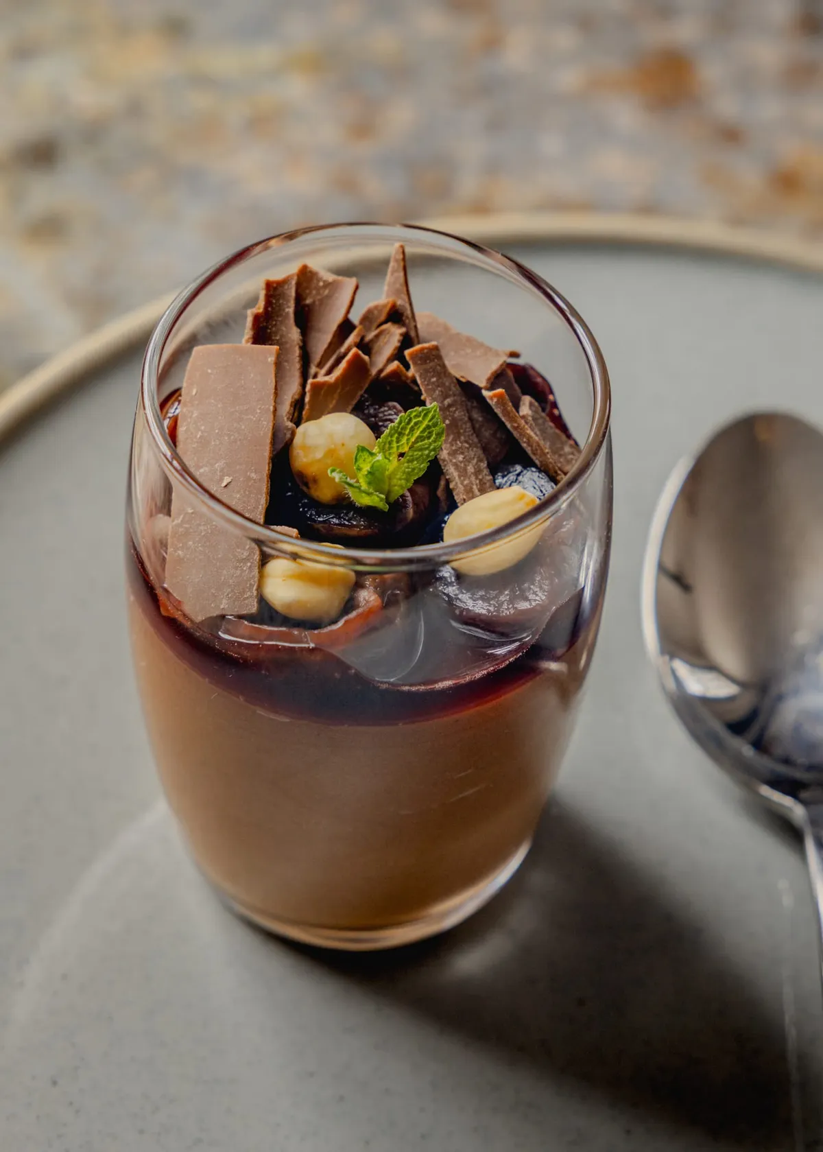 Valrhona chocolate mousse with boozy cherries, hazelnuts and flaked chocolate