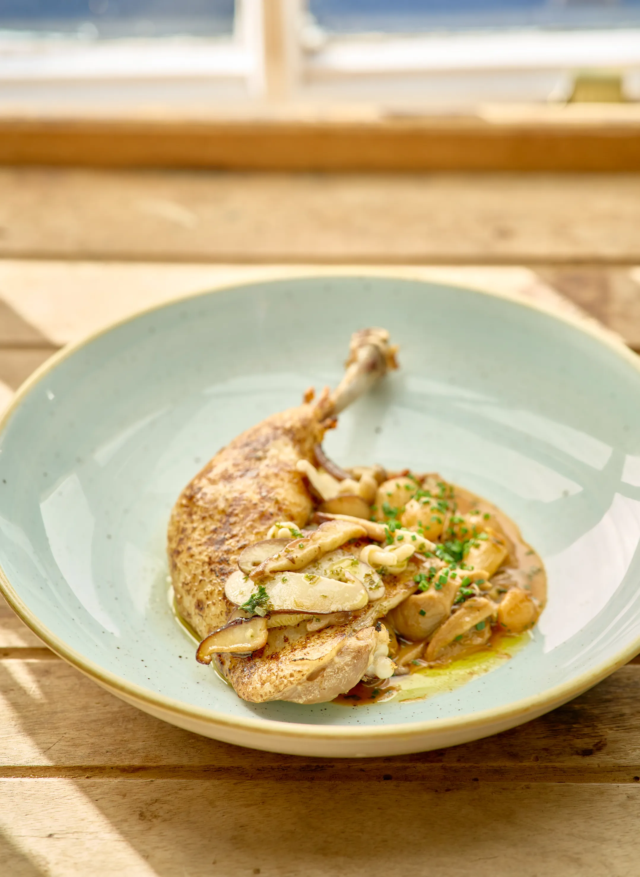 Confit chicken plated